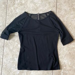 Sheer sleeves, zipper on the back